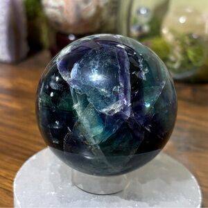Dark blue and purple fluorite sphere